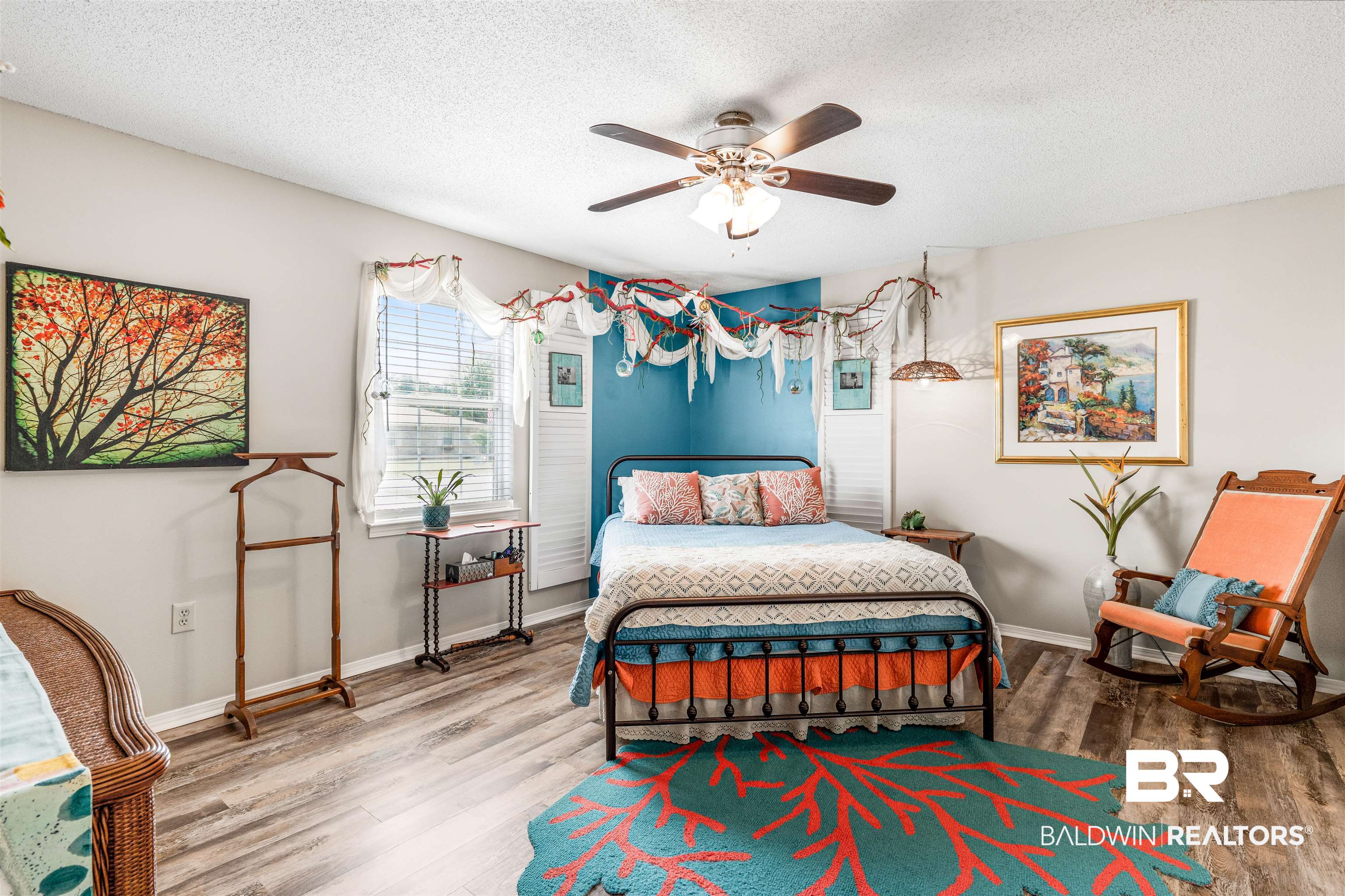 518 Ariel Avenue Foley, AL 36535 - Photo 20 of 47 Bedroom featuring ceiling fan, hardwood / wood-style flooring, and a textured ceiling