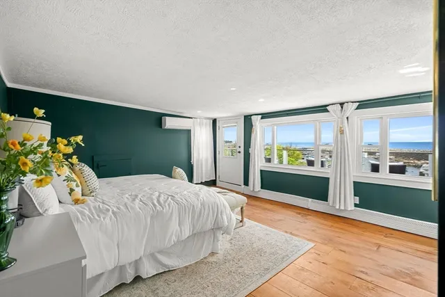 a view of a garden with a house