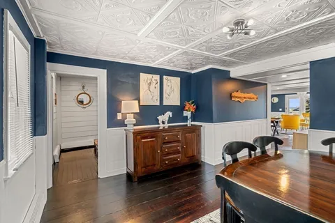a view of a dining room with furniture