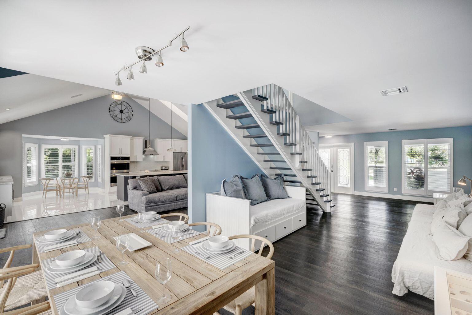 141 Pine Hill Trail West Tequesta, FL 33469 - Photo 11 of 53 a very nice looking living room with furniture and wooden floor
