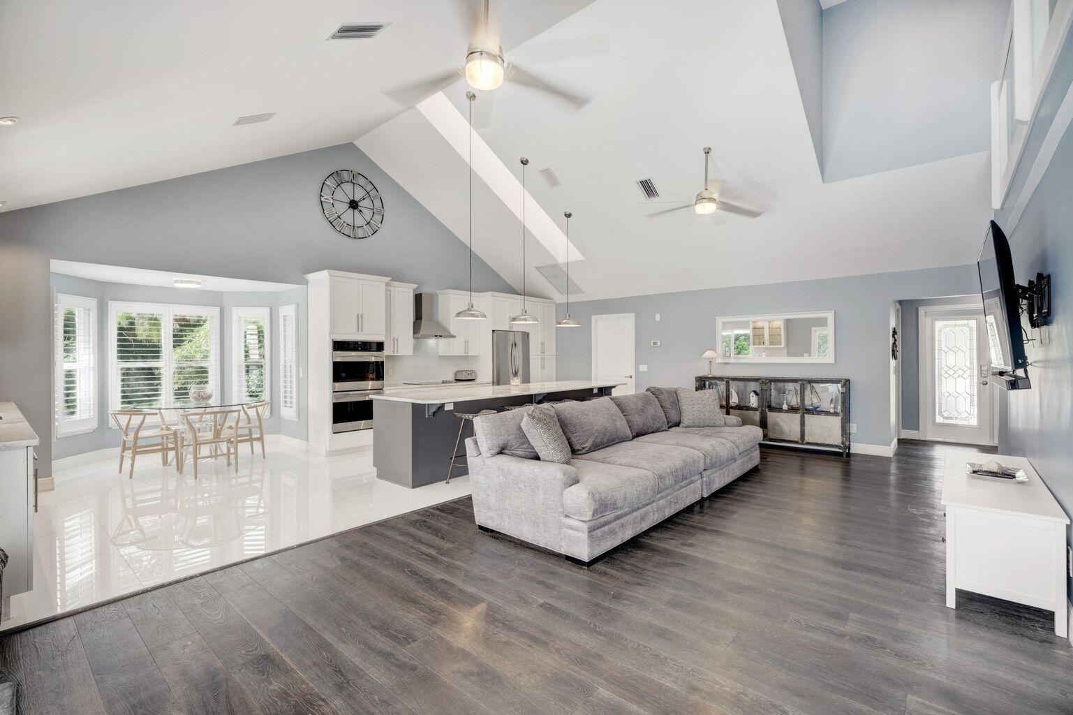 141 Pine Hill Trail West Tequesta, FL 33469 - Photo 15 of 53 a living room with furniture and wooden floor