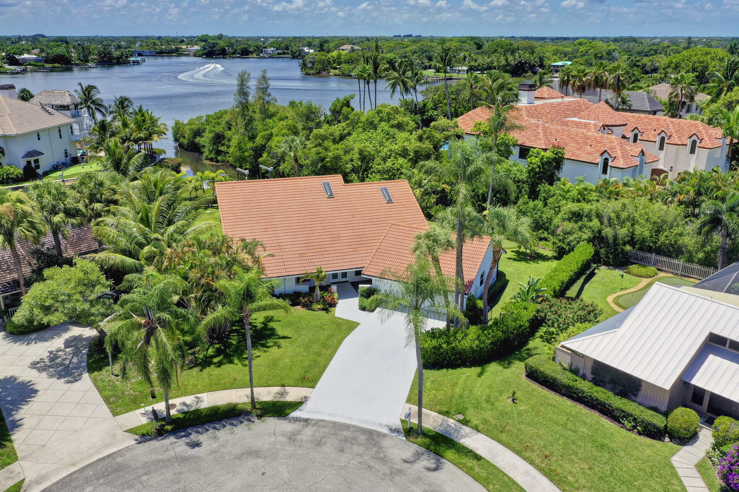 141 Pine Hill Trail West Tequesta, FL 33469 - Photo 6 of 53 an aerial view of a house with garden space and street view