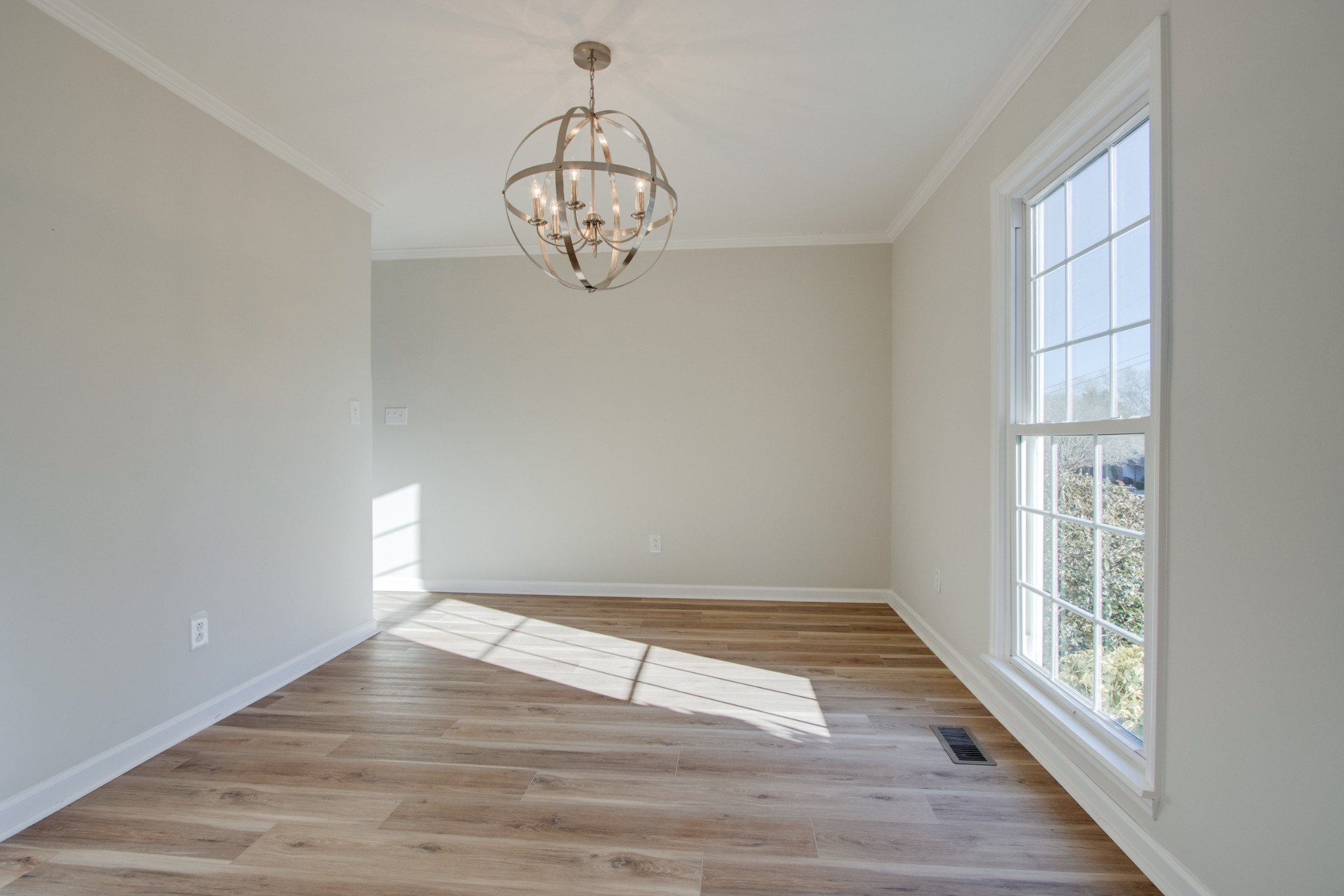 2005 Hunters Place Mount Juliet, TN 37122 - Photo 12 of 36 an empty room with wooden floor and windows