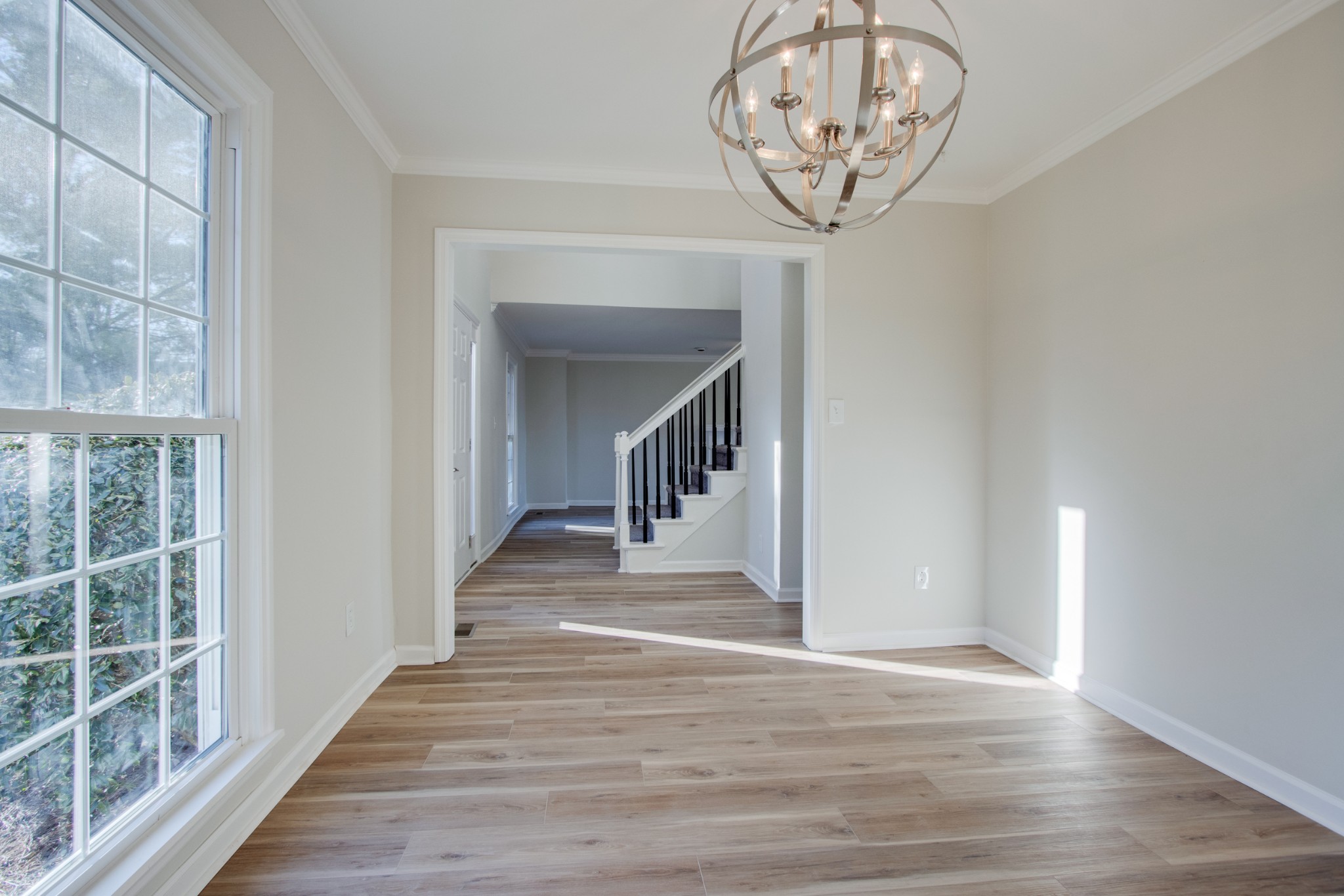 2005 Hunters Place Mount Juliet, TN 37122 - Photo 13 of 36 a view of a hallway with wooden floor and a large window