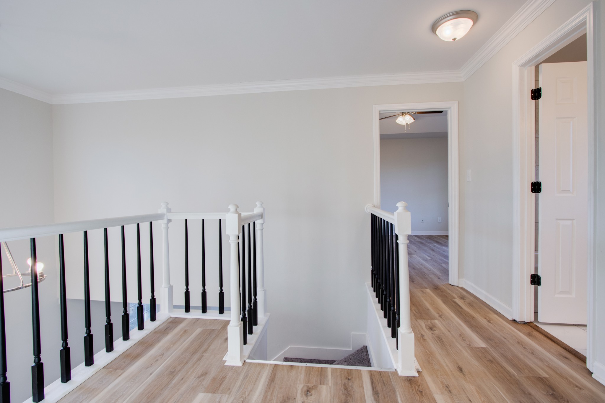 2005 Hunters Place Mount Juliet, TN 37122 - Photo 15 of 36 a view of a hallway with wooden floor and staircase