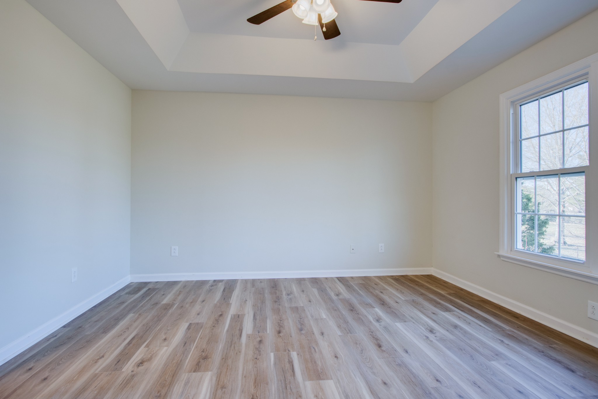 2005 Hunters Place Mount Juliet, TN 37122 - Photo 16 of 36 wooden floor in an empty room with a window