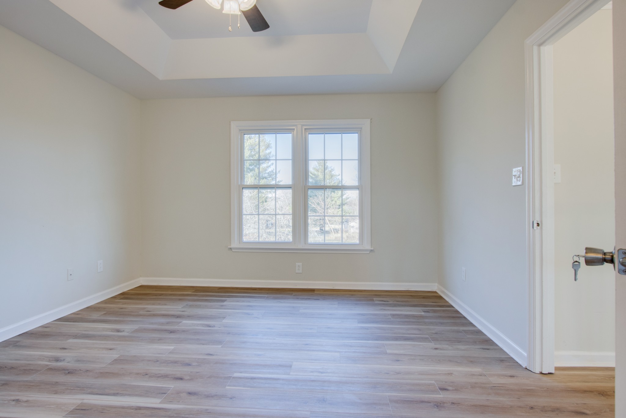2005 Hunters Place Mount Juliet, TN 37122 - Photo 17 of 36 wooden floor in an empty room with a window