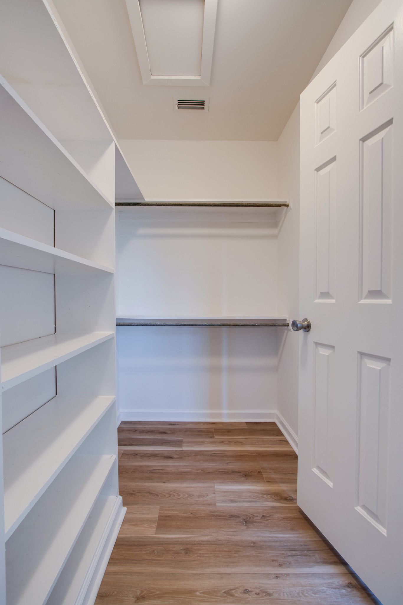 2005 Hunters Place Mount Juliet, TN 37122 - Photo 21 of 36 a view of walk in closet with empty racks