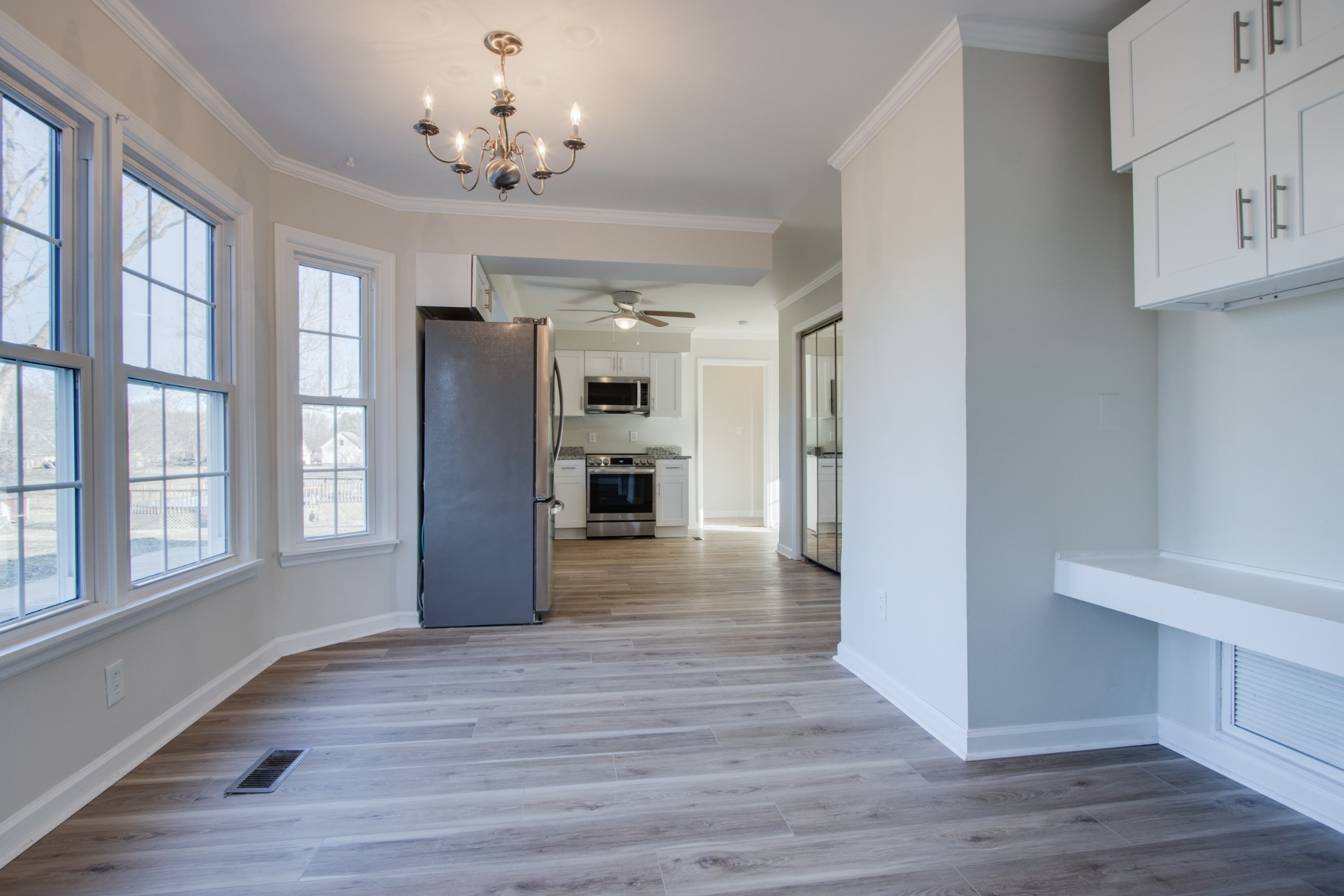 2005 Hunters Place Mount Juliet, TN 37122 - Photo 8 of 36 a view of a kitchen with wooden floor and a kitchen