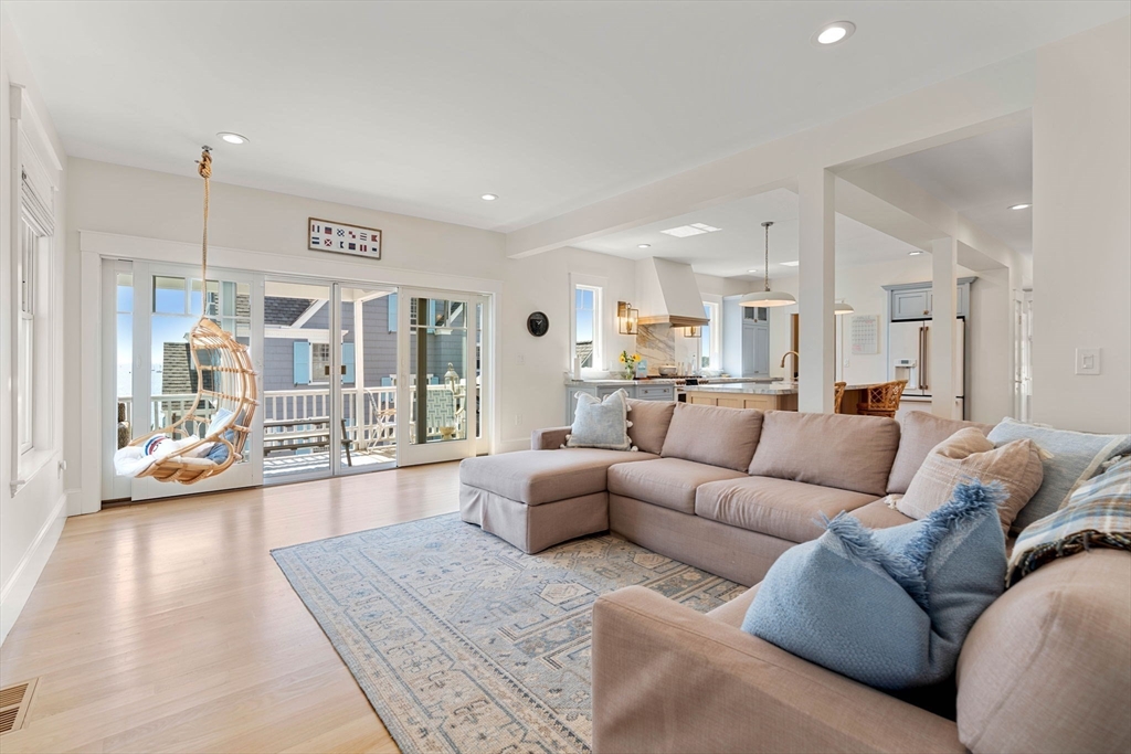 79 Lothrop Street Beverly, MA 01915 - Photo 13 of 42 a living room with furniture and a large window