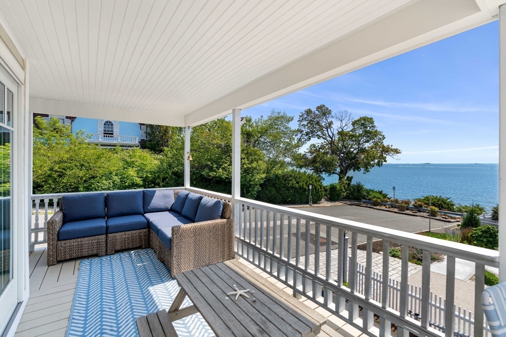 79 Lothrop Street Beverly, MA 01915 - Photo 16 of 42 a view of a couches on the roof deck