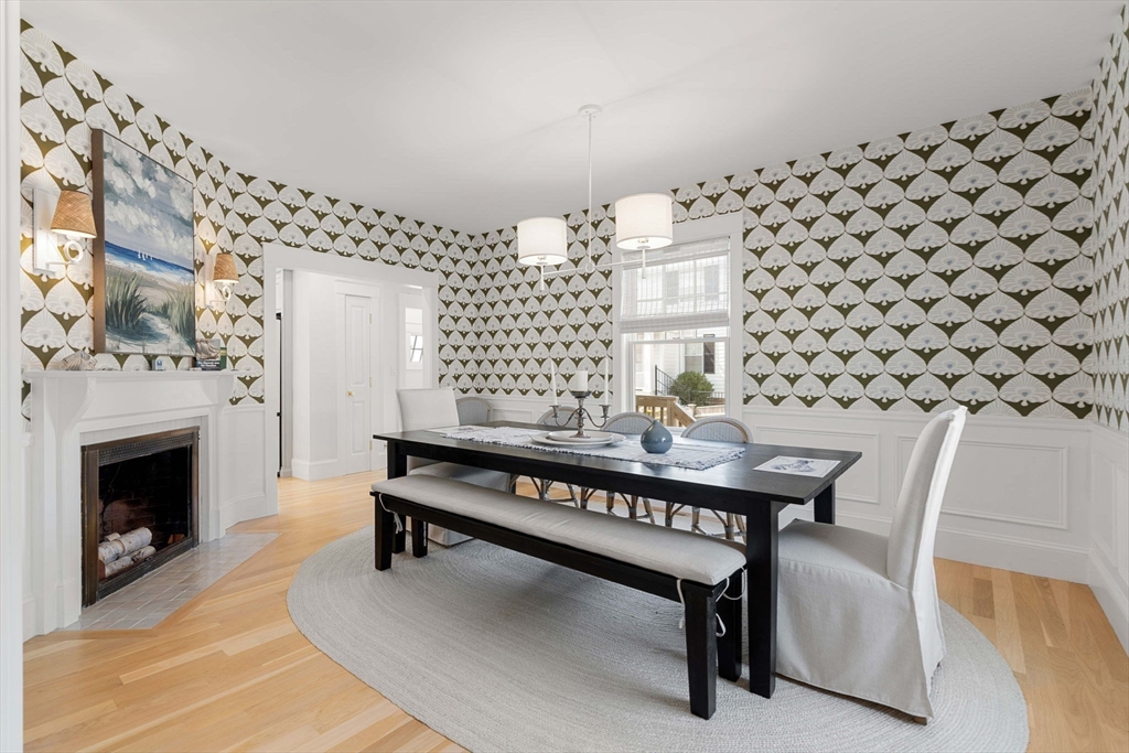 79 Lothrop Street Beverly, MA 01915 - Photo 19 of 42 a view of a livingroom with furniture and a fireplace