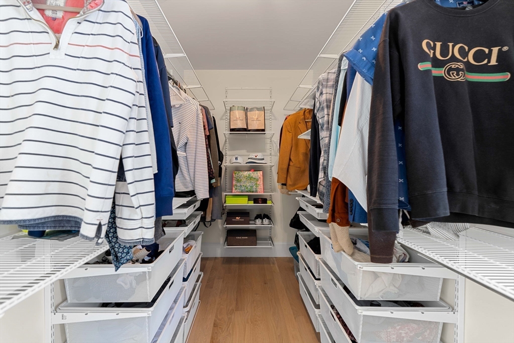 79 Lothrop Street Beverly, MA 01915 - Photo 27 of 42 a view of a kitchen with a sink and a refrigerator