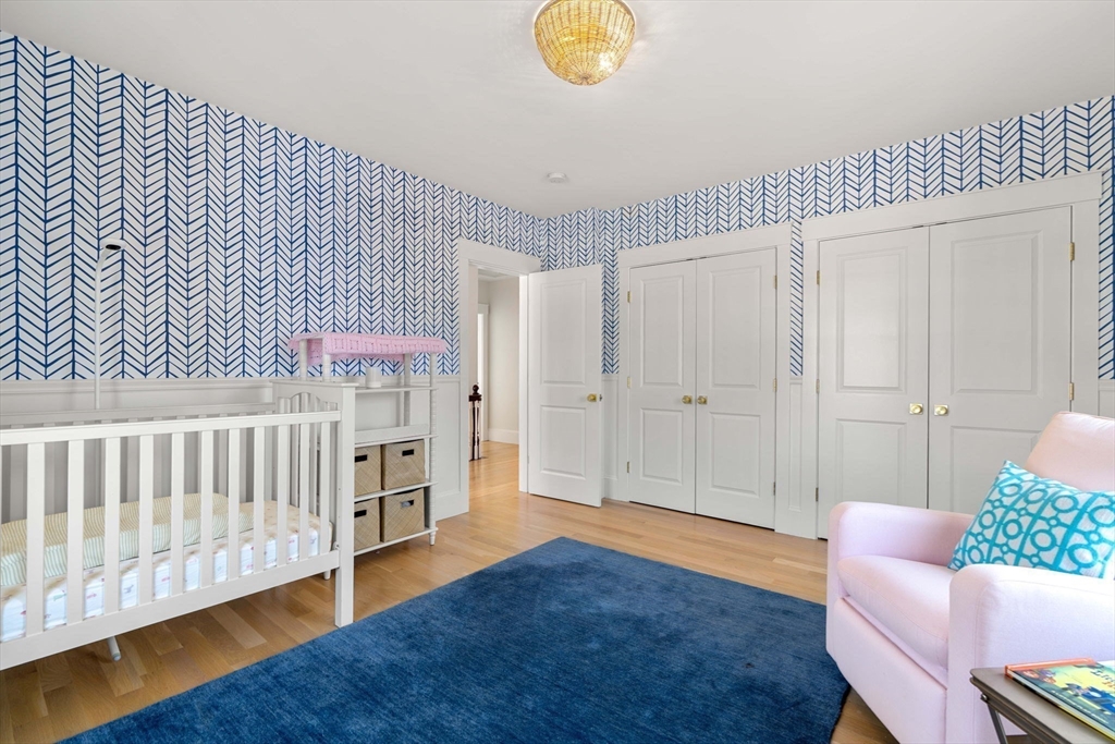 79 Lothrop Street Beverly, MA 01915 - Photo 32 of 42 a livingroom with furniture and a rug