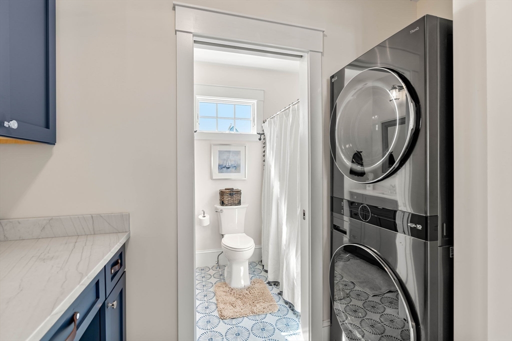 79 Lothrop Street Beverly, MA 01915 - Photo 35 of 42 a view of a bathroom with washing machine