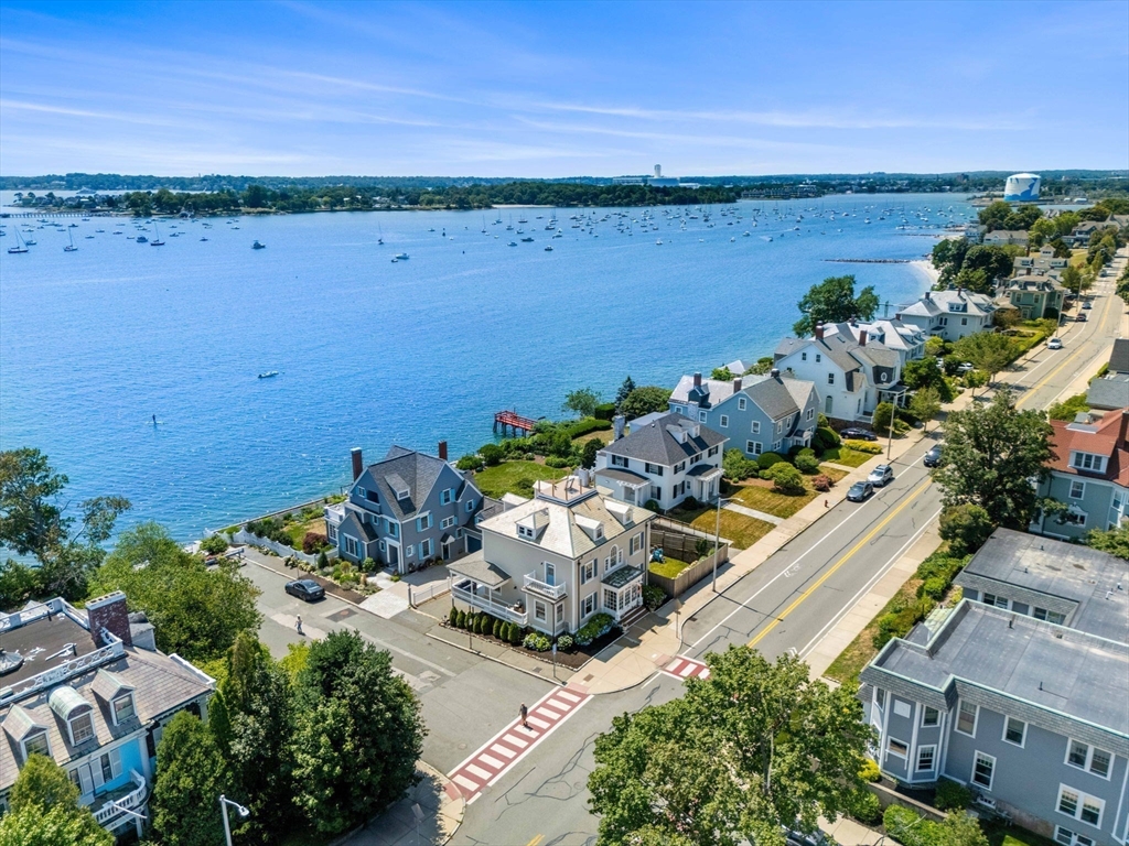 79 Lothrop Street Beverly, MA 01915 - Photo 7 of 42 a view of a lake with a mountain
