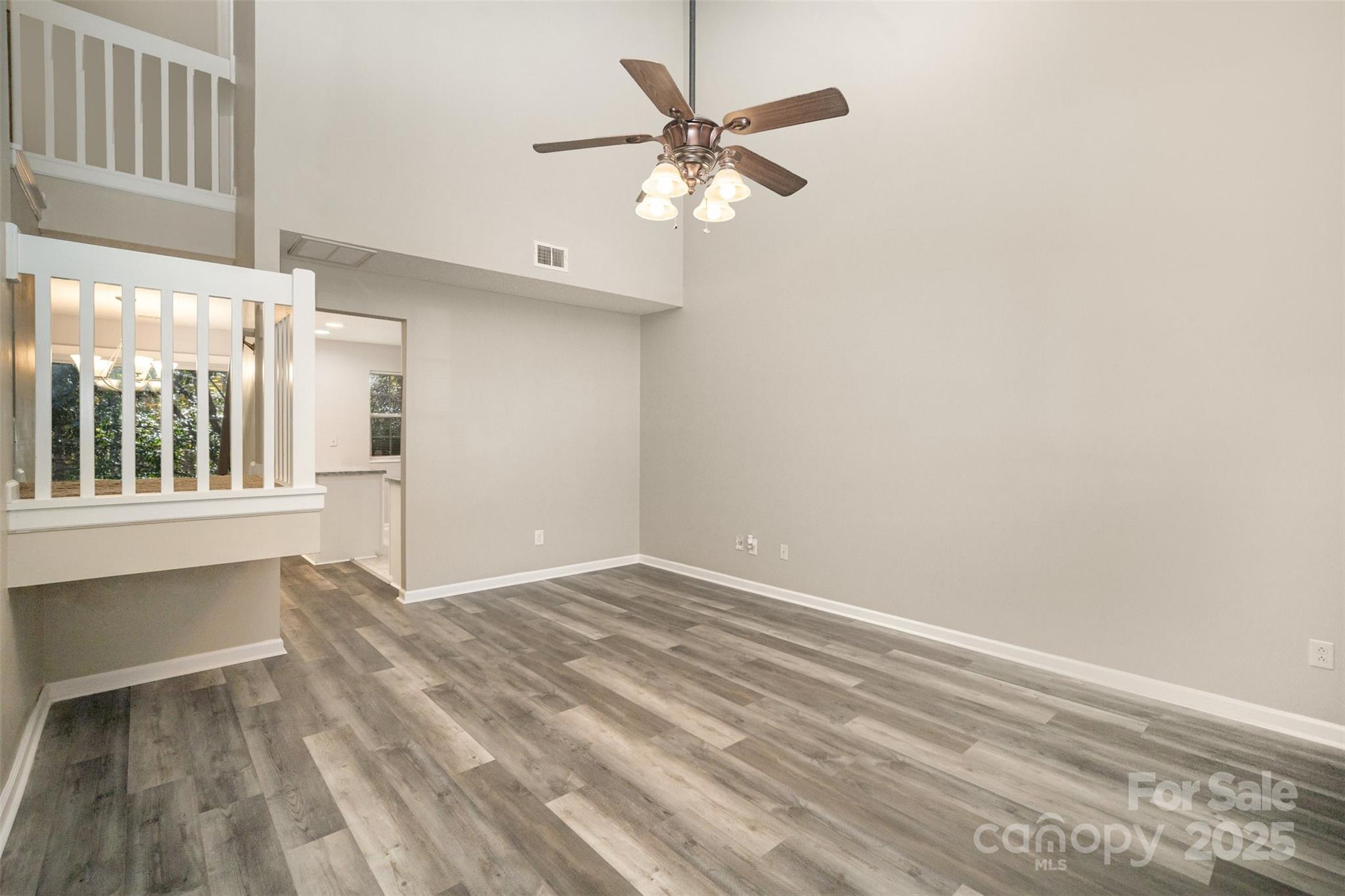 8230 Rudolph Road Charlotte, NC 28216 - Photo 15 of 38 a view of an empty room with a window