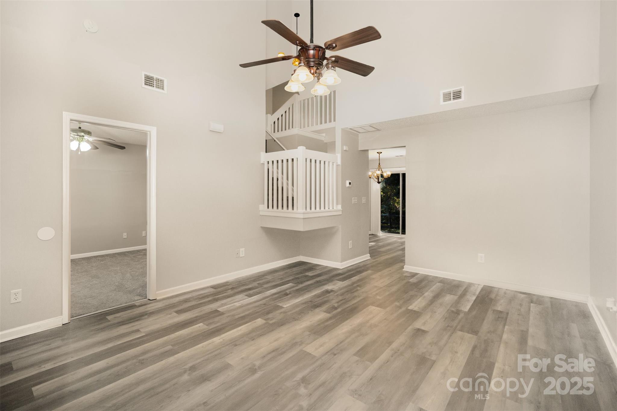 8230 Rudolph Road Charlotte, NC 28216 - Photo 16 of 38 a view of an empty room with a window