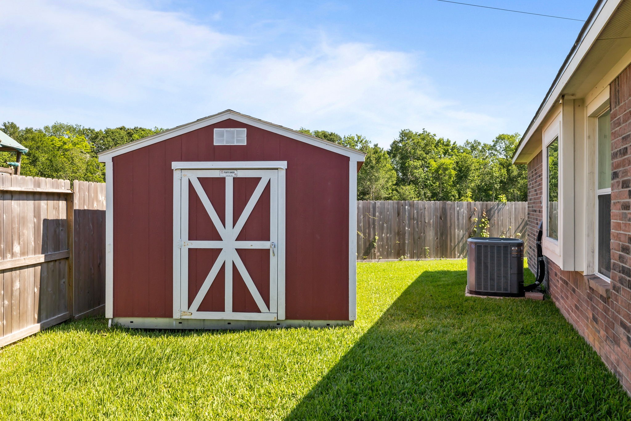 445 Decoster Boulevard Alvin, TX 77511 - Photo 27 of 32 New Storage shed for all your extra "things"
