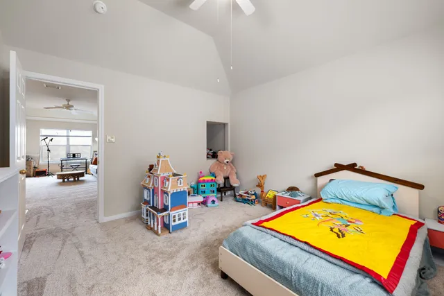 a room with furniture and air hockey table