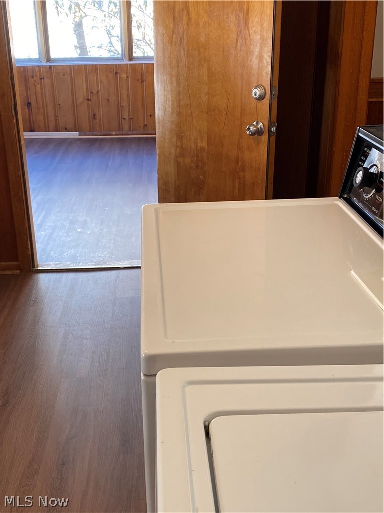 14549 Cedar Road Cleveland, OH 44121 - Photo 10 of 23 Washroom with dark hardwood / wood-style flooring and washer / dryer