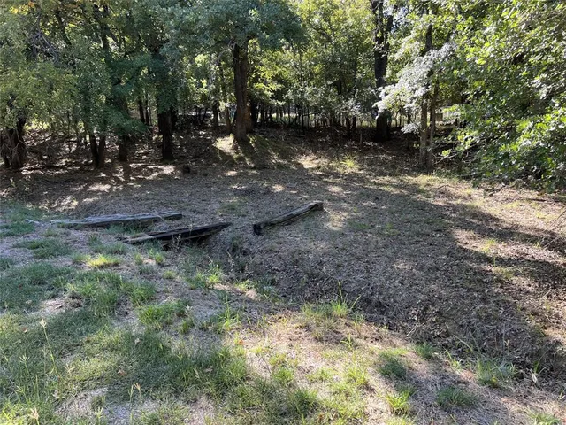 an aerial view of a house with mountain view