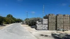 a view of a road with a building in the background
