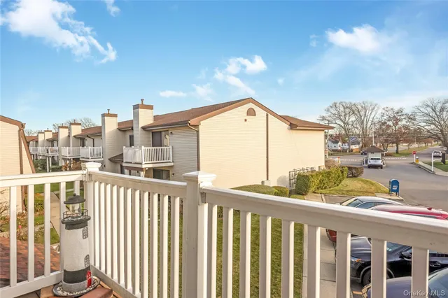 a view of a balcony with city view