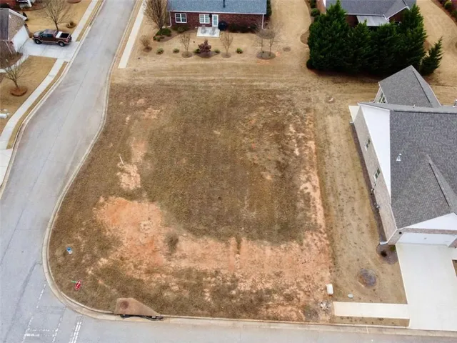 a view of large house with a big yard