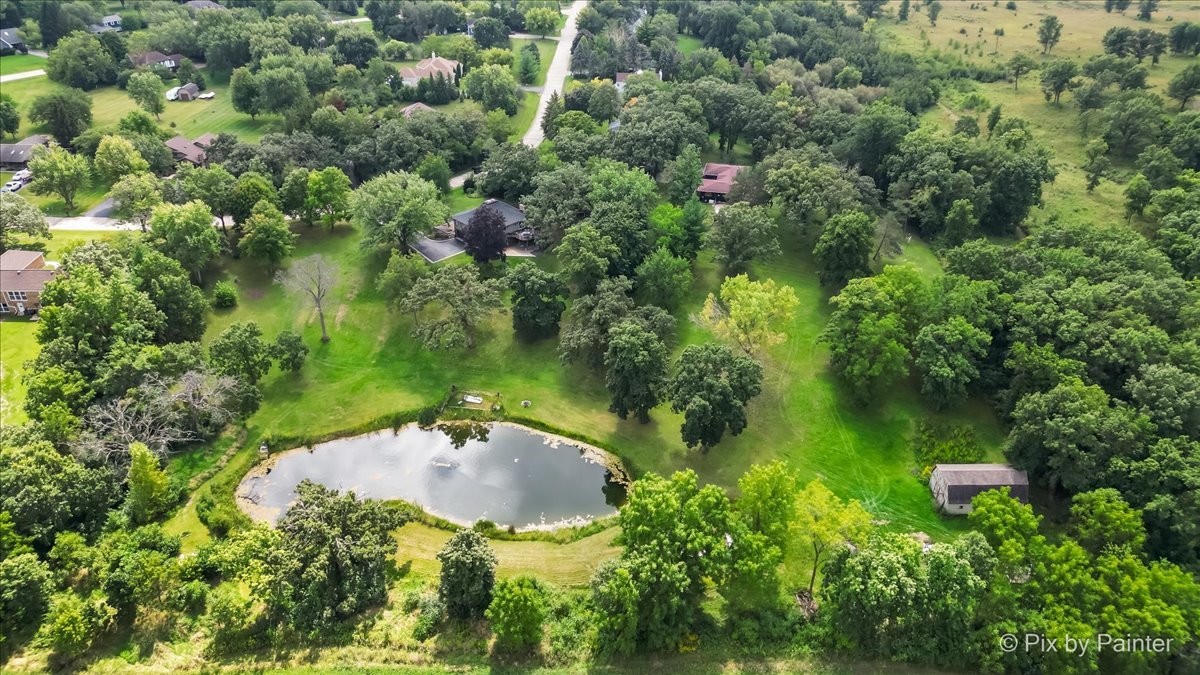 6111 Ridgeview Drive Huntley, IL 60142 - Photo 51 of 54 an aerial view of a house with a yard