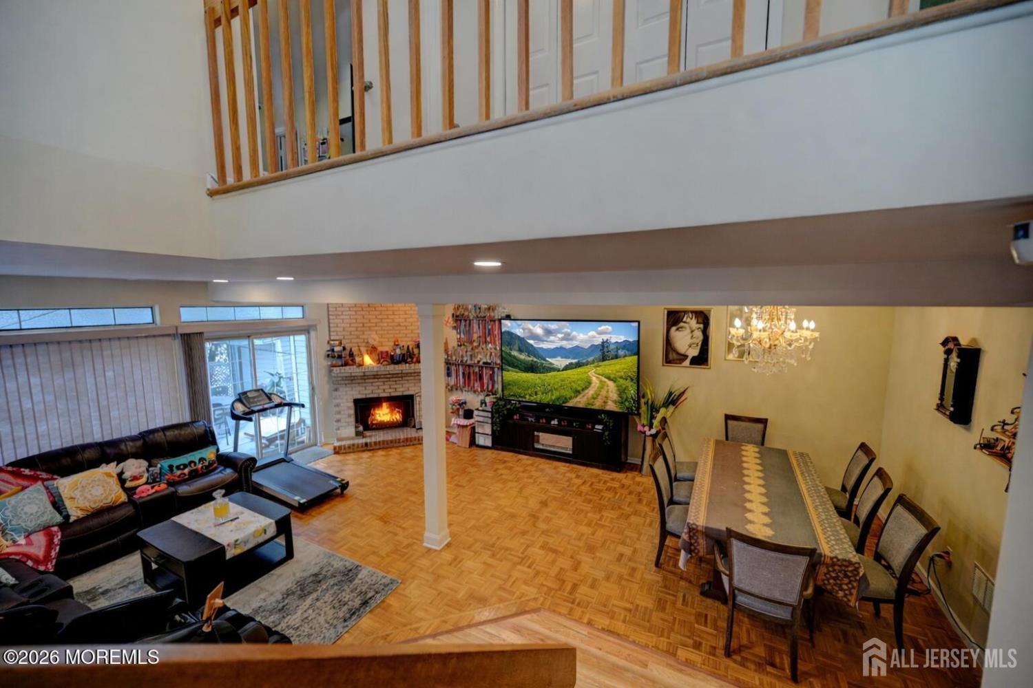 22 Borell Square Parlin, NJ 08859 - Photo 26 of 32 a living room with furniture and a flat screen tv