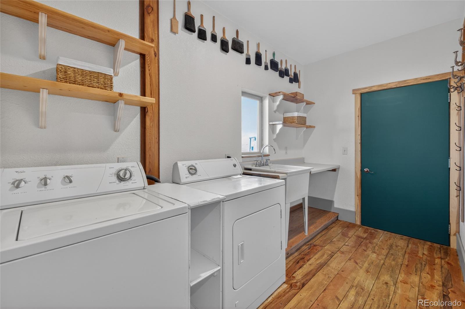 31885 Ridge Road Ramah, CO 80832 - Photo 22 of 47 a utility room with dryer and washer
