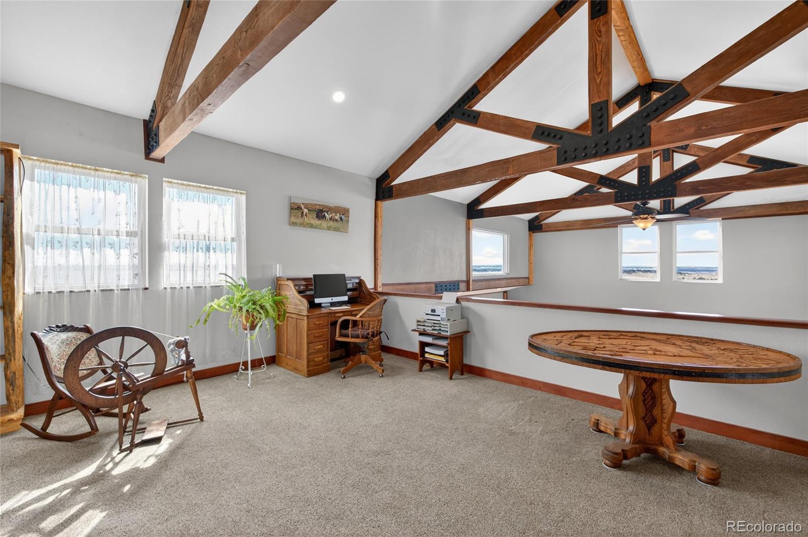 31885 Ridge Road Ramah, CO 80832 - Photo 26 of 47 a living room with furniture and a window