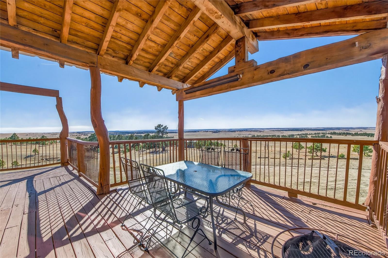 31885 Ridge Road Ramah, CO 80832 - Photo 31 of 47 a view of a balcony with furniture