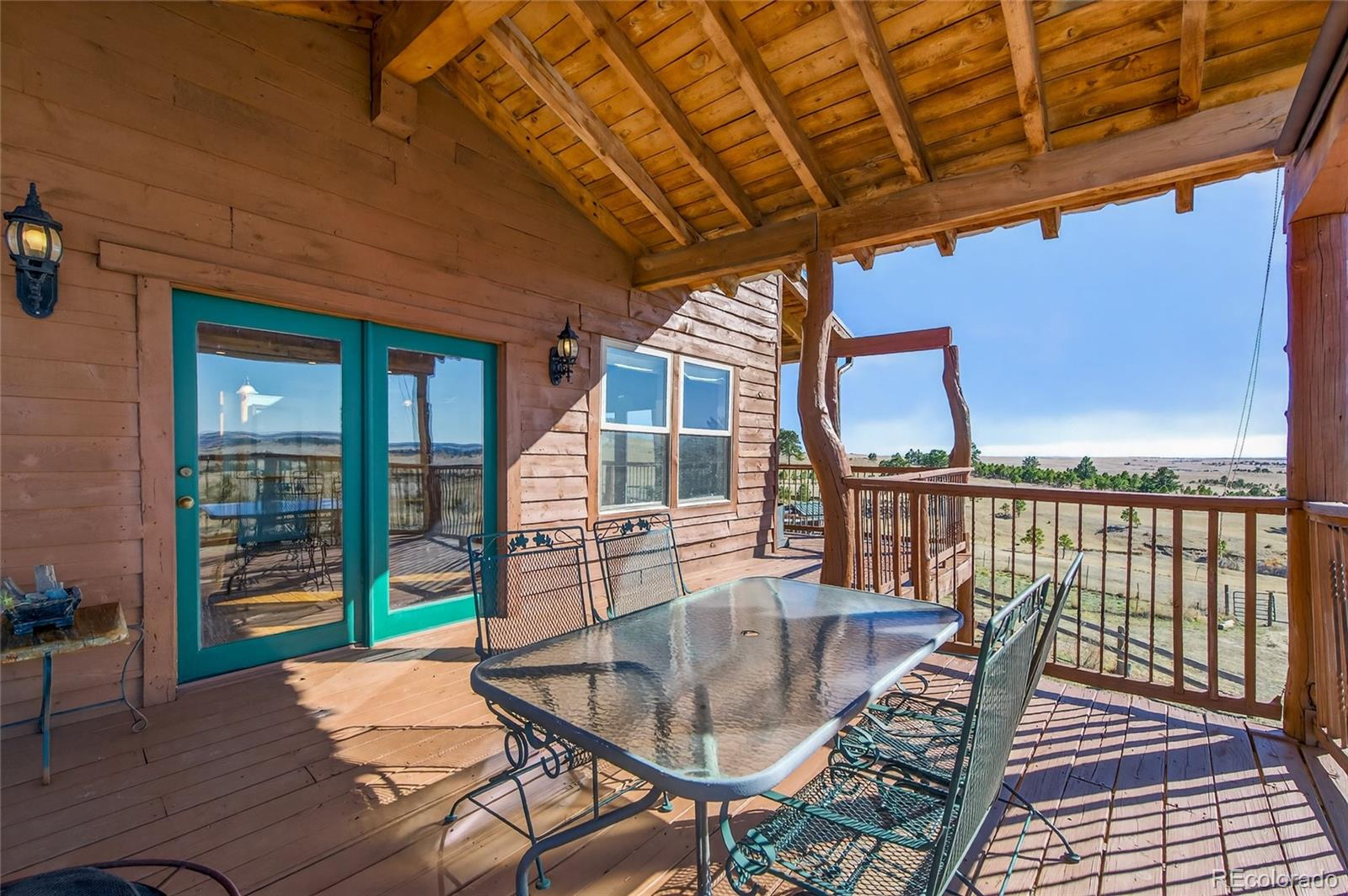 31885 Ridge Road Ramah, CO 80832 - Photo 32 of 47 a dining room with furniture and outdoor view