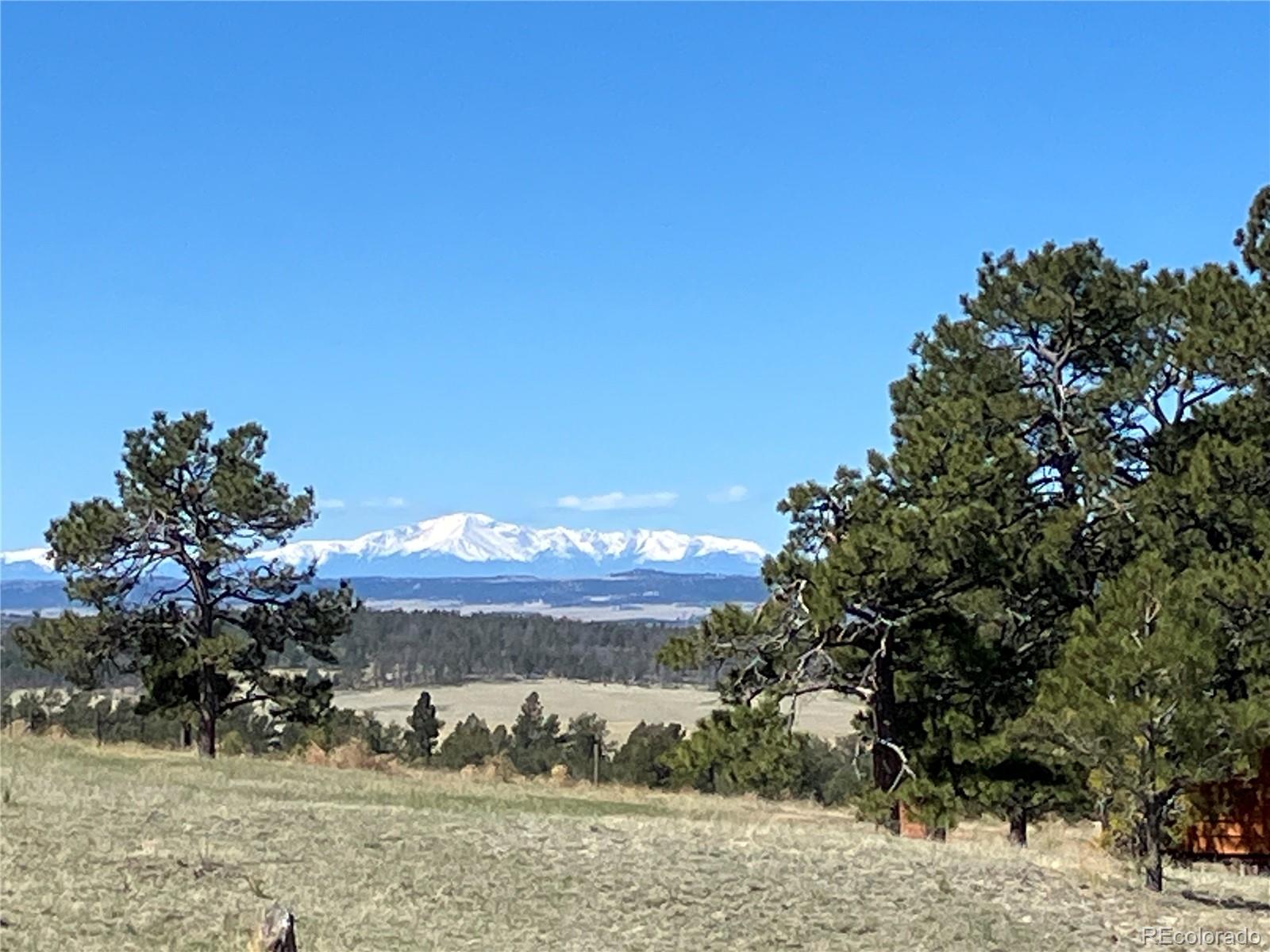 31885 Ridge Road Ramah, CO 80832 - Photo 45 of 47 a view of a lake with a mountain in the background