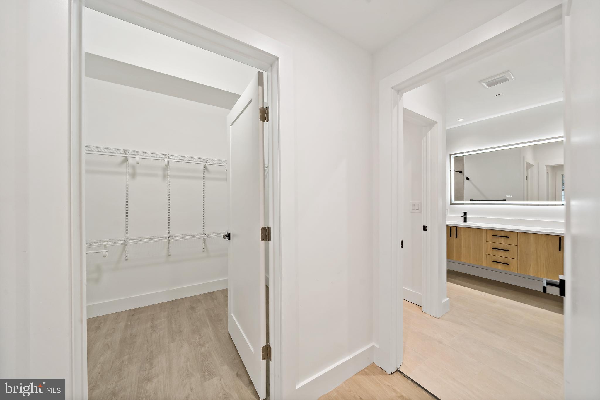 326 North 12th Street, Unit 201 Philadelphia, PA 19107 - Photo 19 of 22 a view of walk in closet with hardwood floor