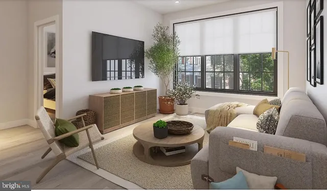 a living room with furniture a table and a large window