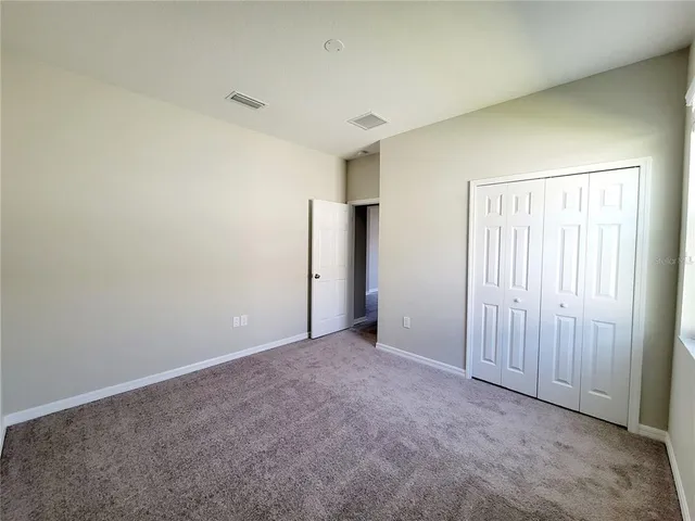 an empty room with a natural light
