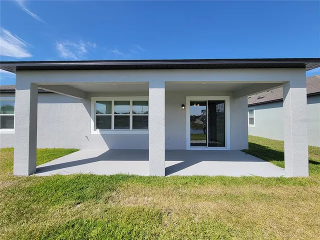 a house with garden in front of it