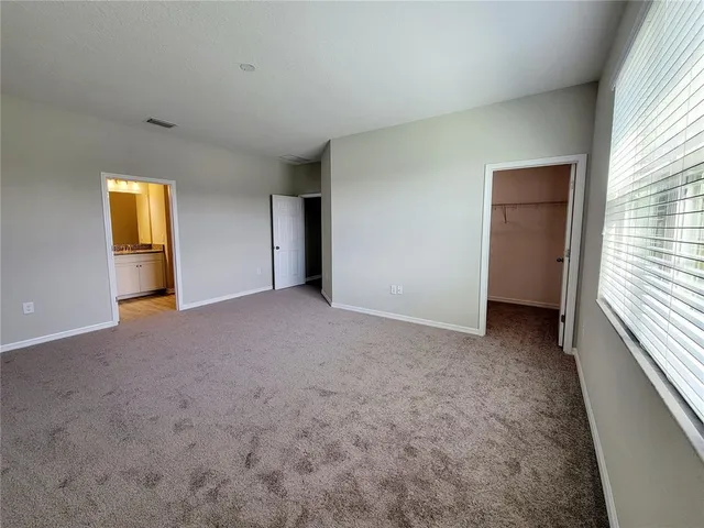a view of empty room with a window