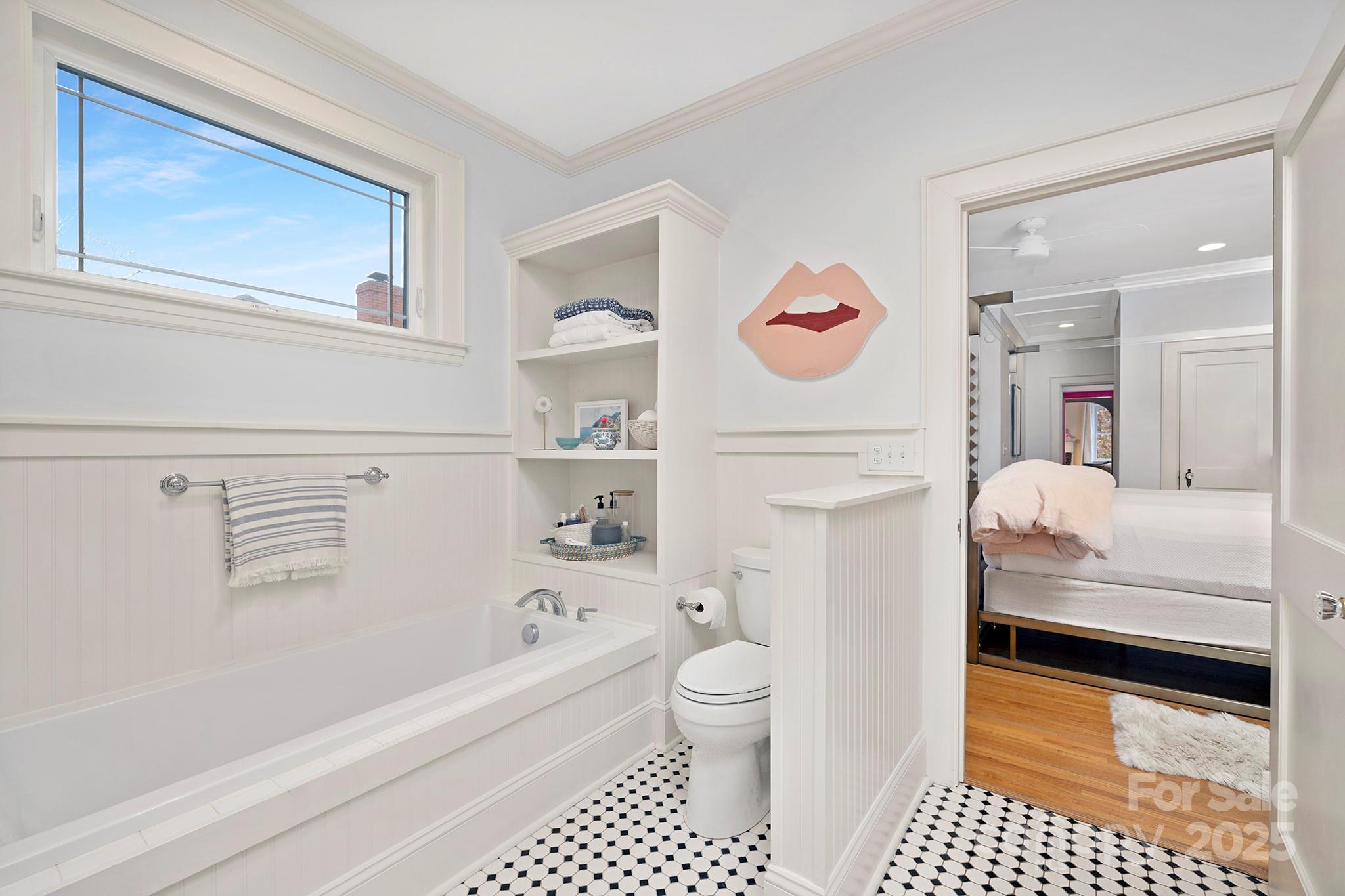 2000 Winter Street Charlotte, NC 28205 - Photo 17 of 40 a bathroom with a sink a toilet and a bathtub