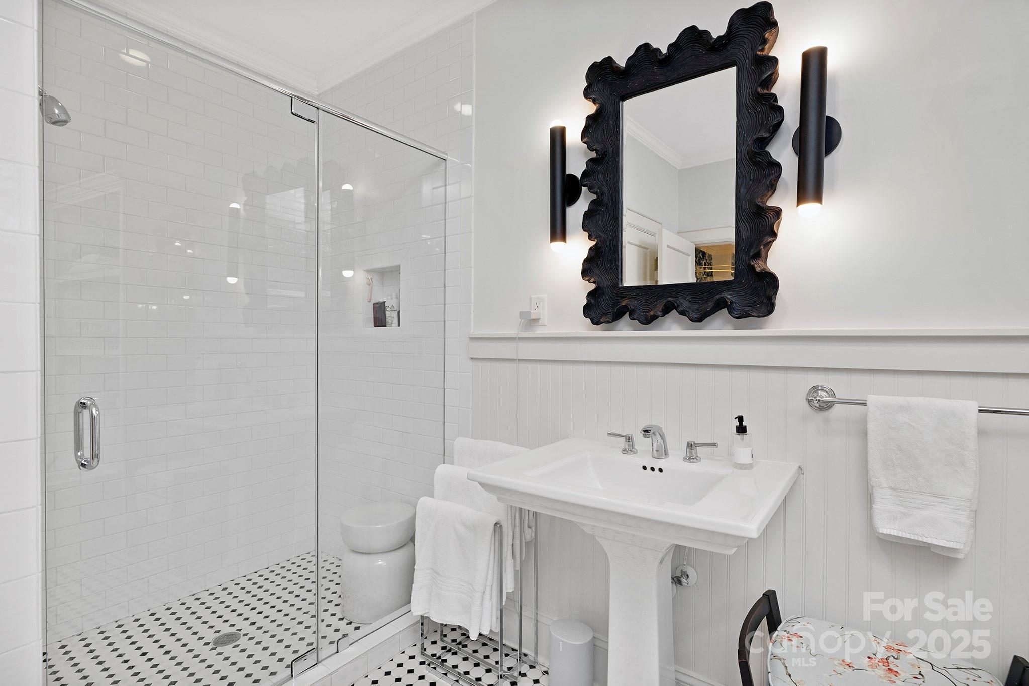 2000 Winter Street Charlotte, NC 28205 - Photo 18 of 40 a bathroom with a sink toilet and shower