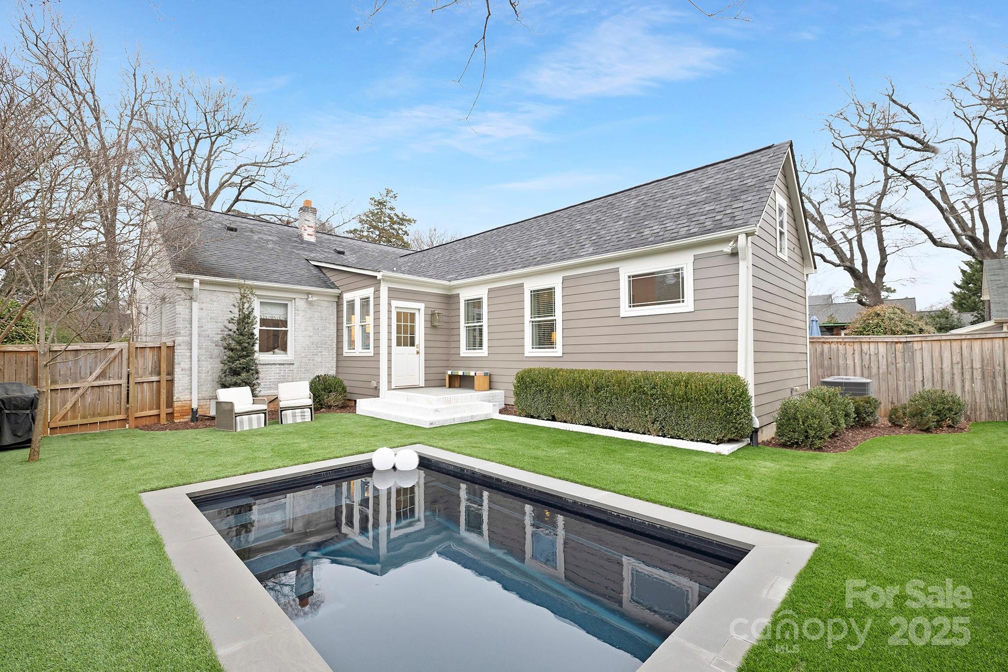 2000 Winter Street Charlotte, NC 28205 - Photo 20 of 40 a view of a house with a yard and furniture