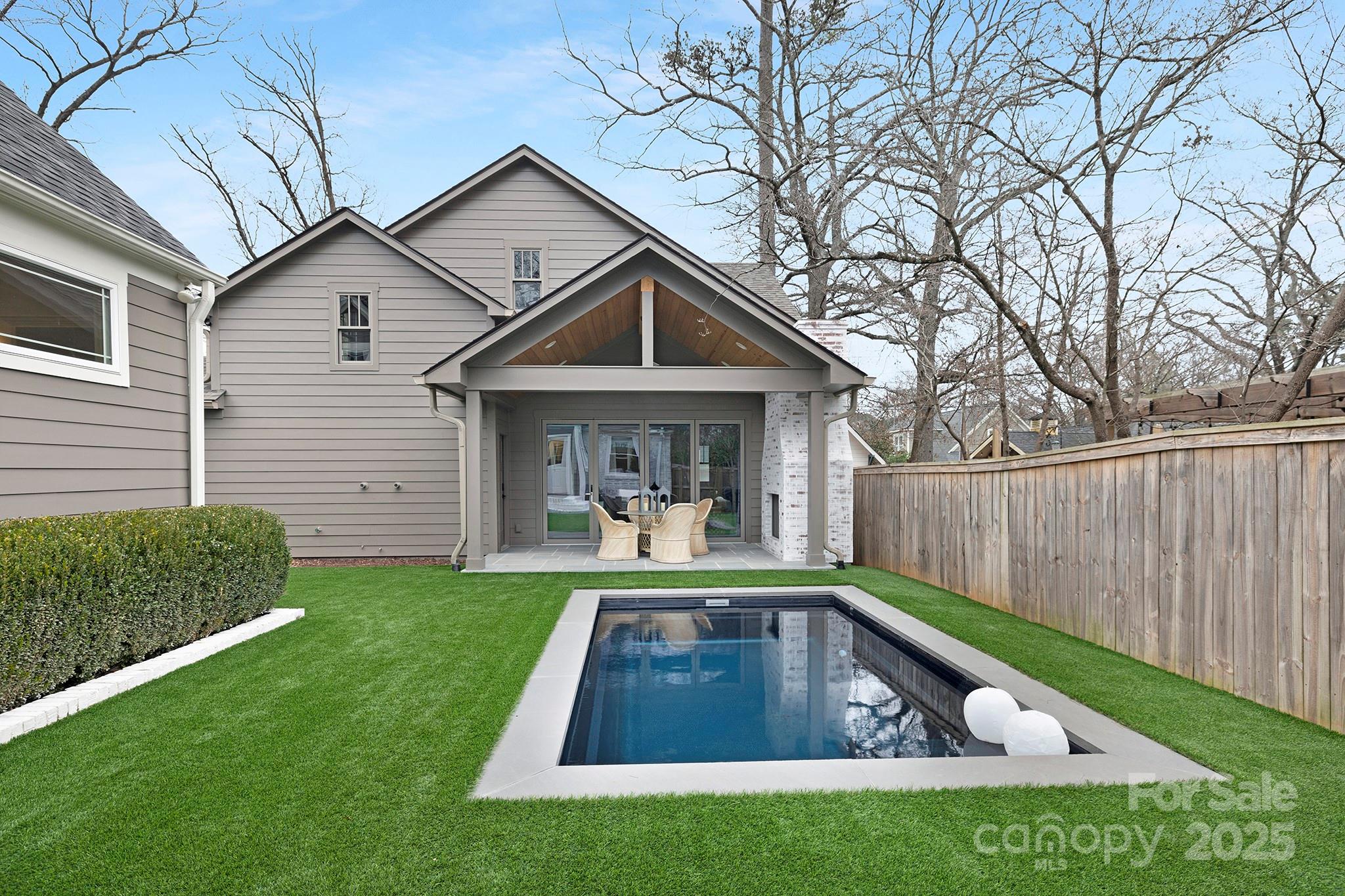 2000 Winter Street Charlotte, NC 28205 - Photo 21 of 40 a front view of house with yard and outdoor seating