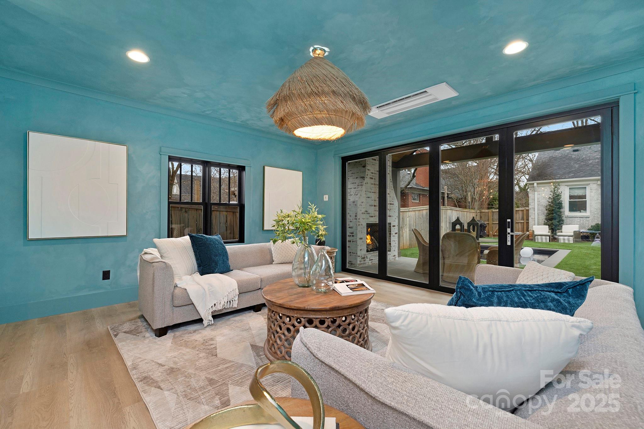 2000 Winter Street Charlotte, NC 28205 - Photo 27 of 40 a living room with furniture and a large window
