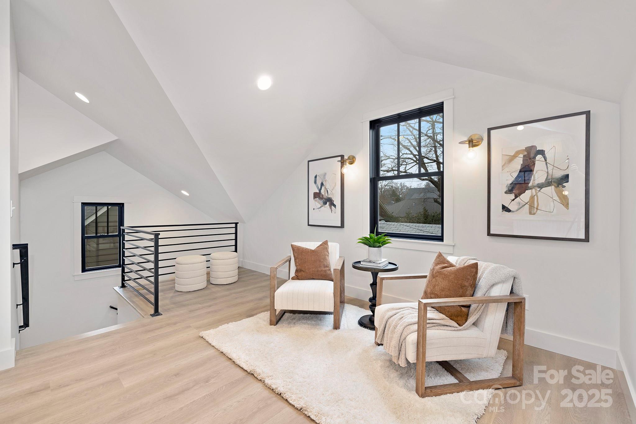 2000 Winter Street Charlotte, NC 28205 - Photo 28 of 40 a living room with furniture and wooden floor