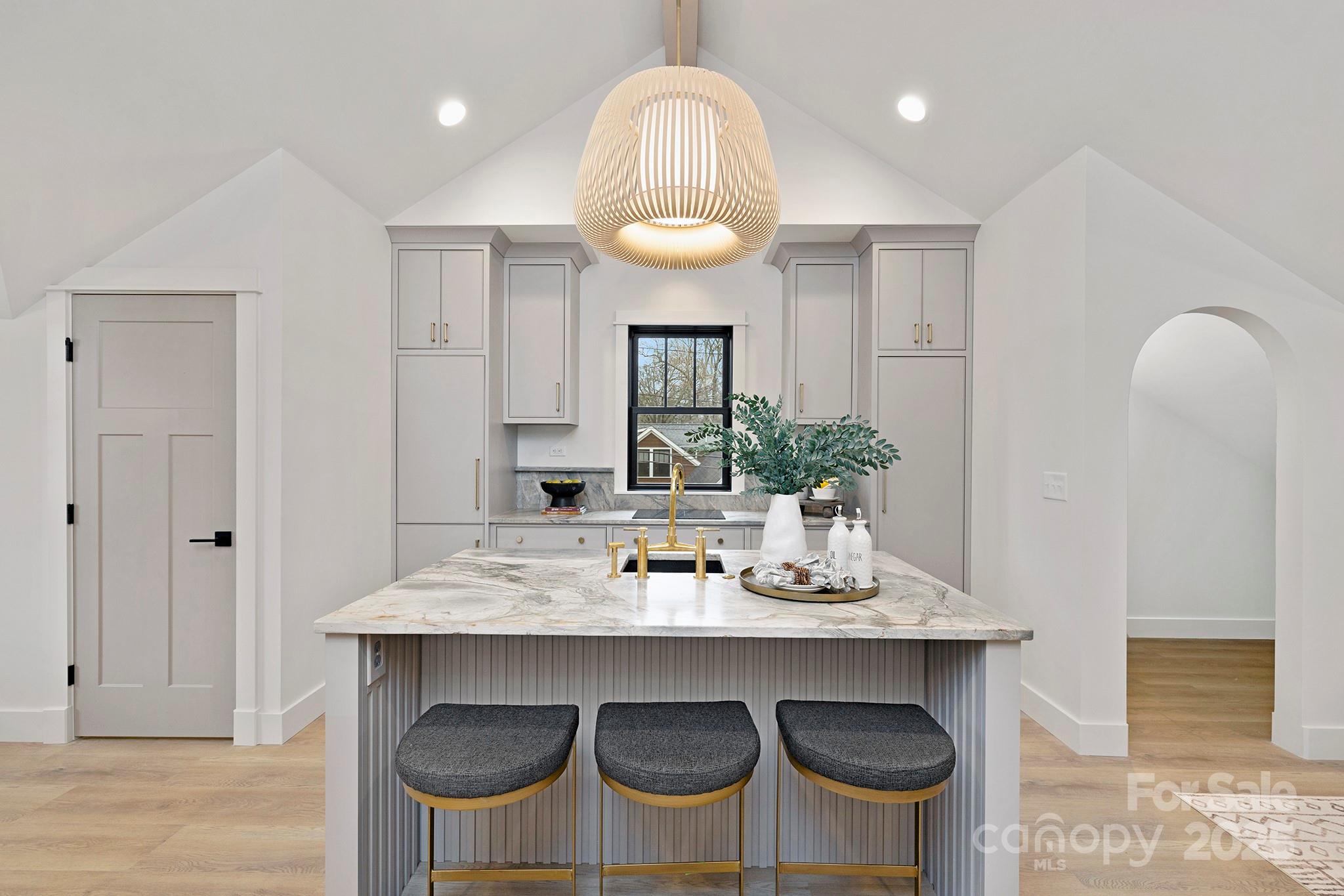 2000 Winter Street Charlotte, NC 28205 - Photo 29 of 40 a view of a dining room with furniture and wooden floor