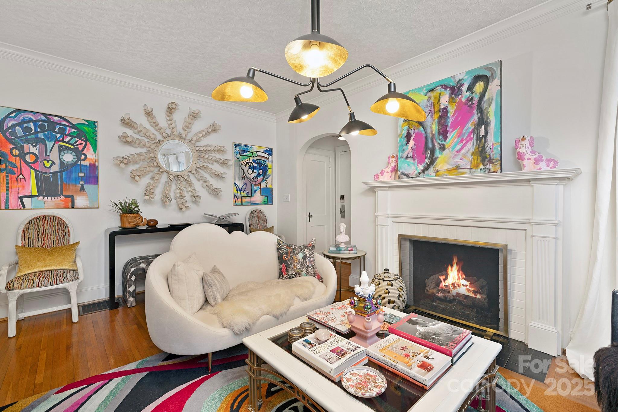 2000 Winter Street Charlotte, NC 28205 - Photo 3 of 40 a living room with furniture and a fireplace