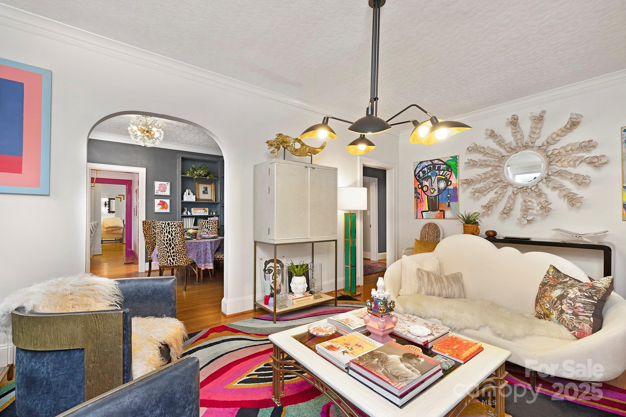 2000 Winter Street Charlotte, NC 28205 - Photo 5 of 40 a living room with furniture and a chandelier